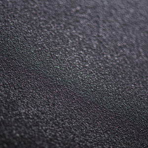 dark atomised powder showing varied particle size and morphology
